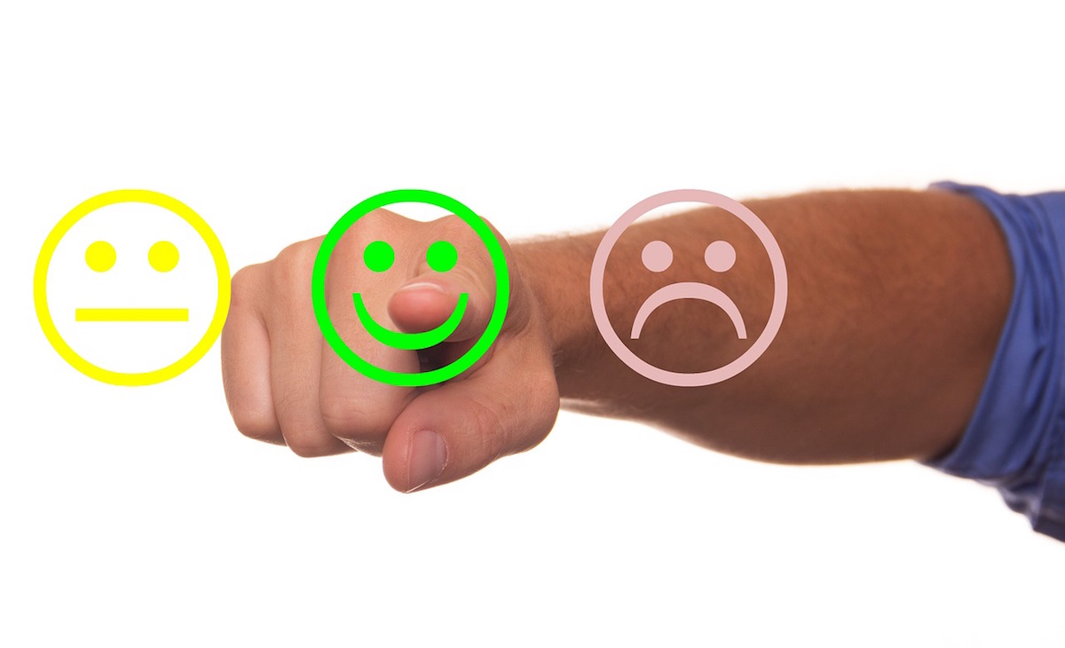 Pointing to a smiley face when considering online reviews for your PT website.